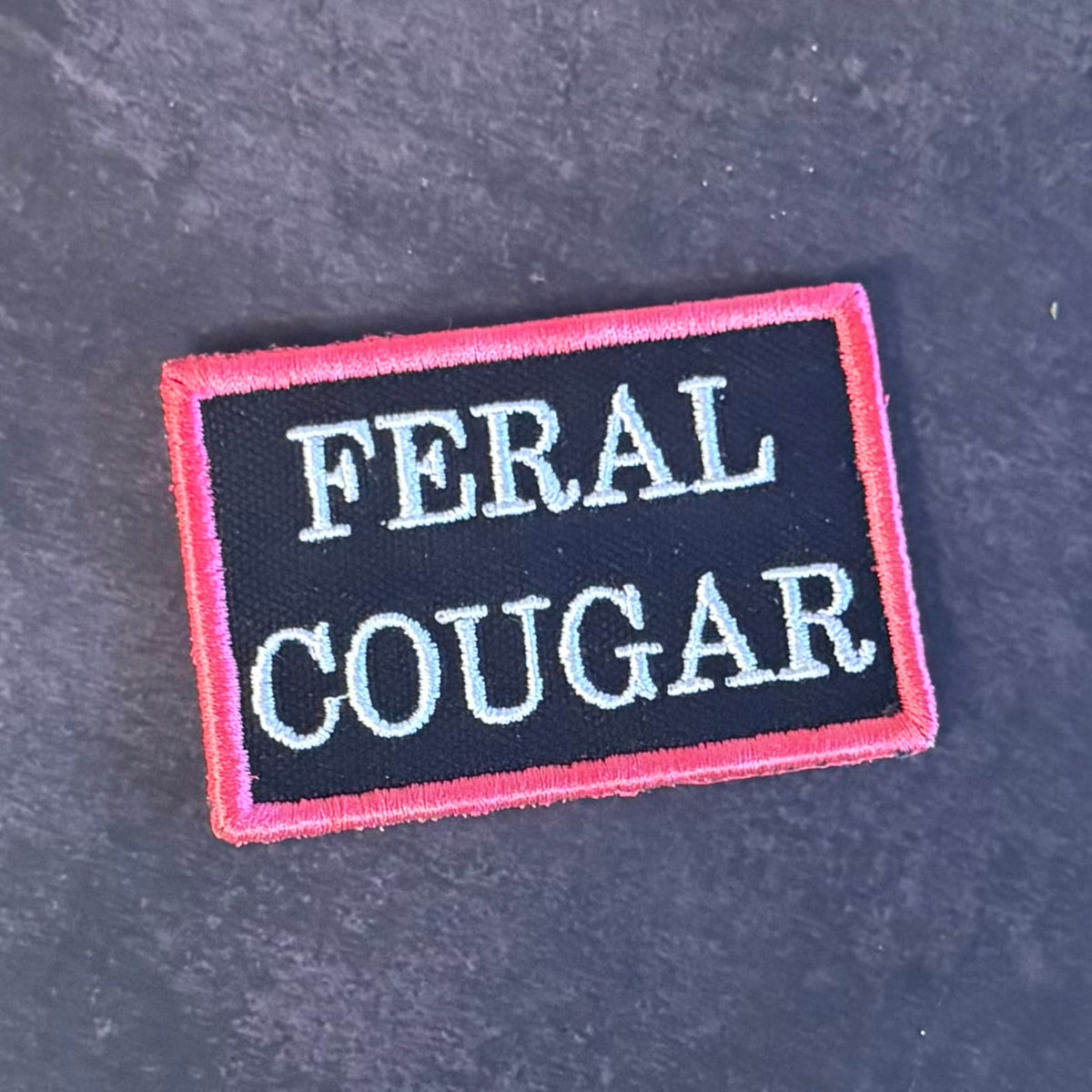 Feral Cougar Funny Morale Patch, 2x3" | Made in USA | VELCRO® Brand Hook Backing