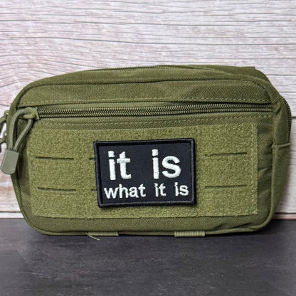 It Is What It Is Funny Morale Patch, 2x3" | Made in USA | VELCRO® Brand Hook Backing