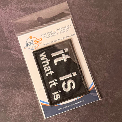 It Is What It Is Funny Morale Patch, 2x3" | Made in USA | VELCRO® Brand Hook Backing