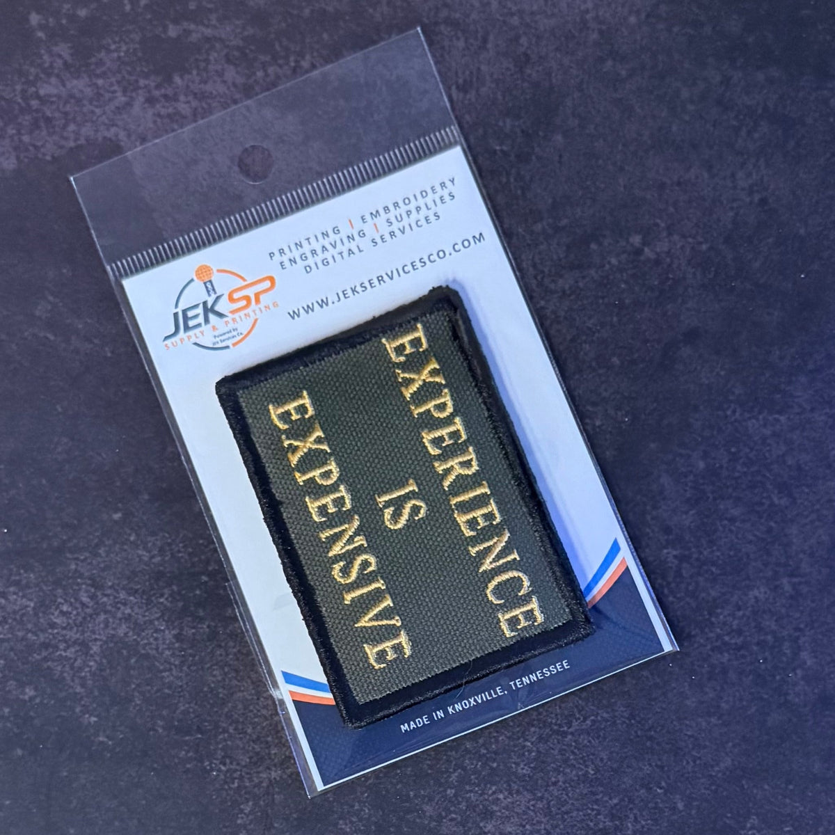 Experience Is Expensive Funny Tactical Morale Patch, 2x3" | Made in USA | VELCRO® Brand Hook Backing