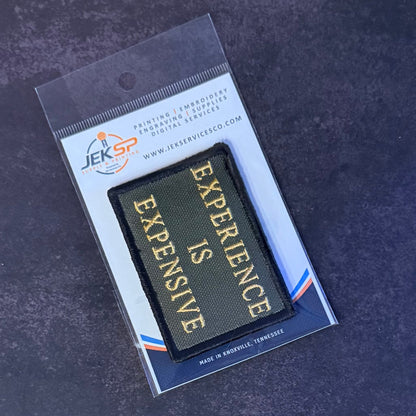 Experience Is Expensive Funny Tactical Morale Patch, 2x3" | Made in USA | VELCRO® Brand Hook Backing