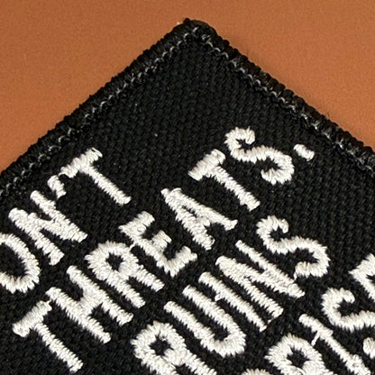 I Don't Make Threats, That Ruins The Surprise Funny Morale Patch, 2x3" | Made in USA | VELCRO® Brand Hook Backing