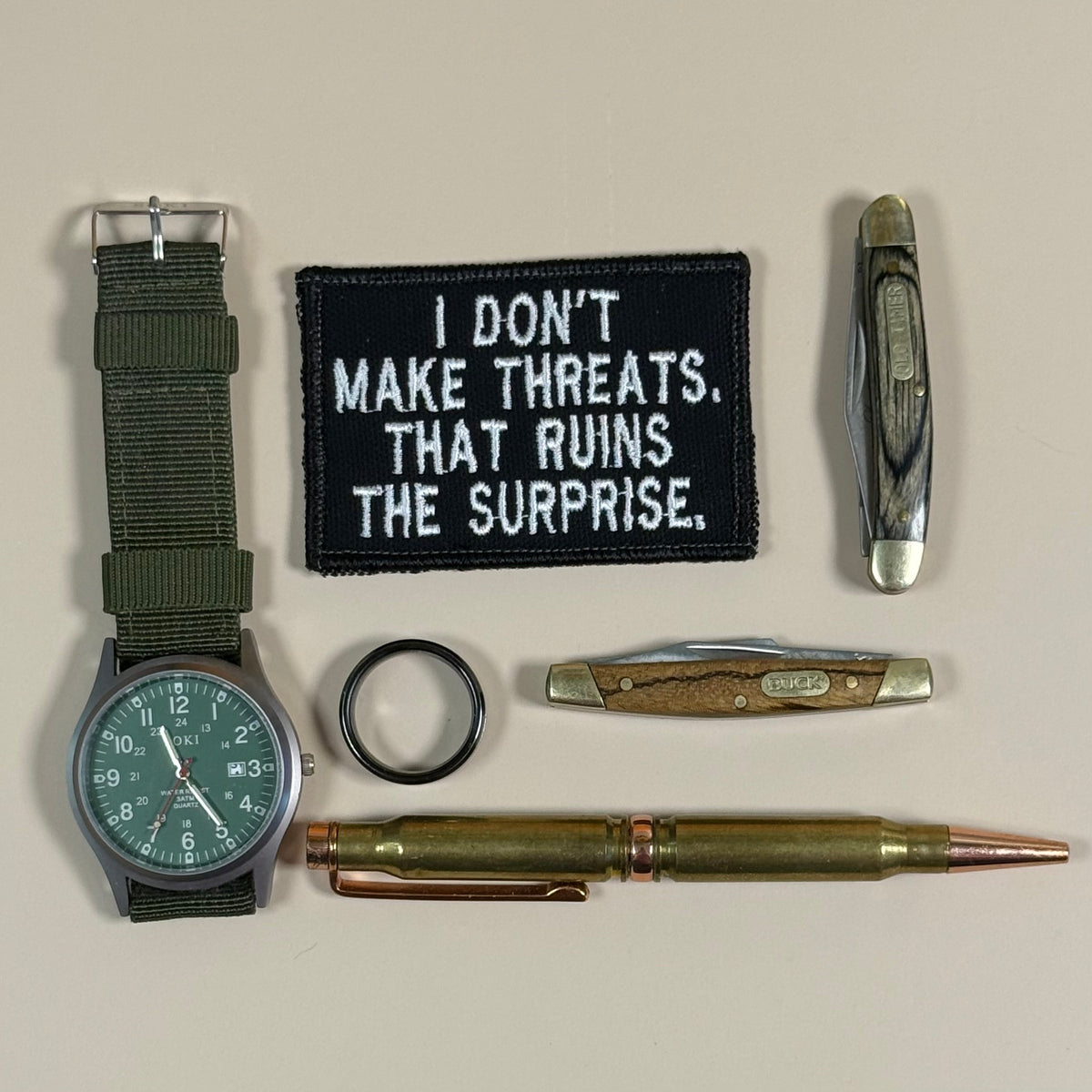 I Don't Make Threats, That Ruins The Surprise Funny Morale Patch, 2x3" | Made in USA | VELCRO® Brand Hook Backing