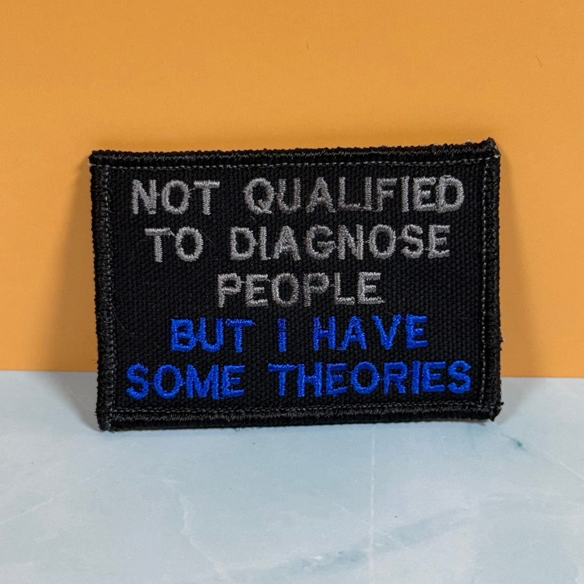 Not Qualified to Diagnose People, But I Have Theories Funny Morale Patch, 2x3" | Made in USA | VELCRO® Brand Hook Backing