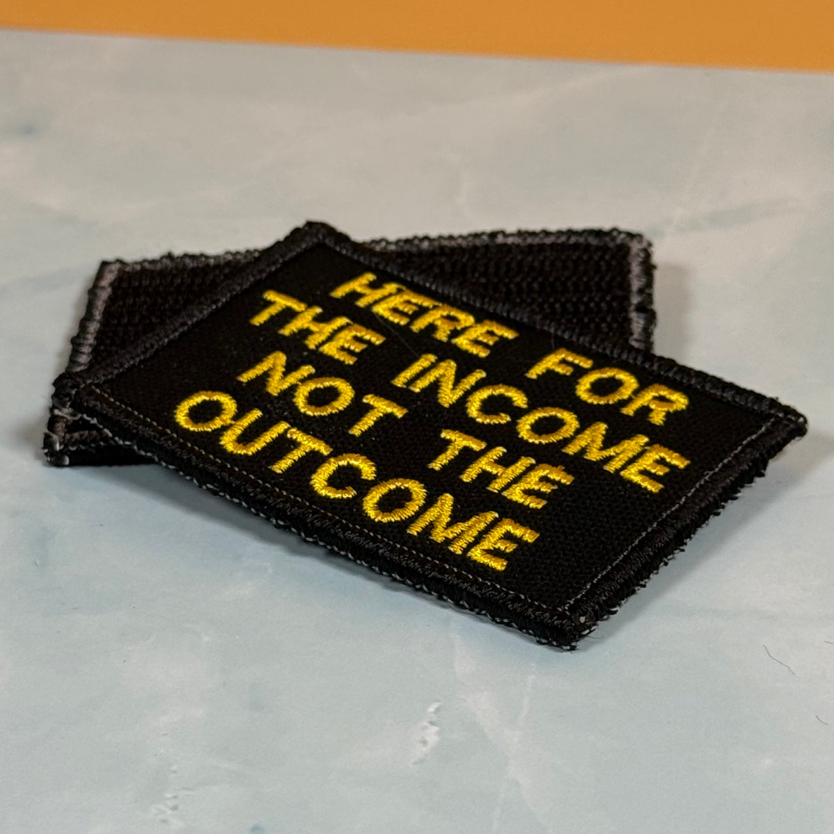 Here For The Income, Not The Outcome Funny Embroidered Morale Patch, 2x3" | VELCRO® Brand Hook Backing