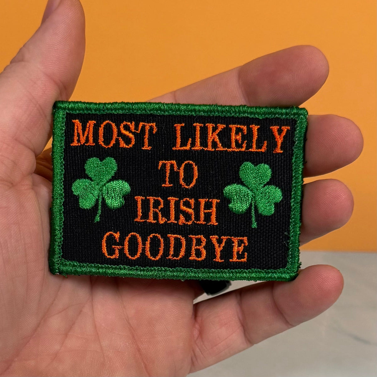 Most Likely To Irish Goodbye Funny Morale Patch, 2x3" | Made in USA | VELCRO® Brand Hook Backing