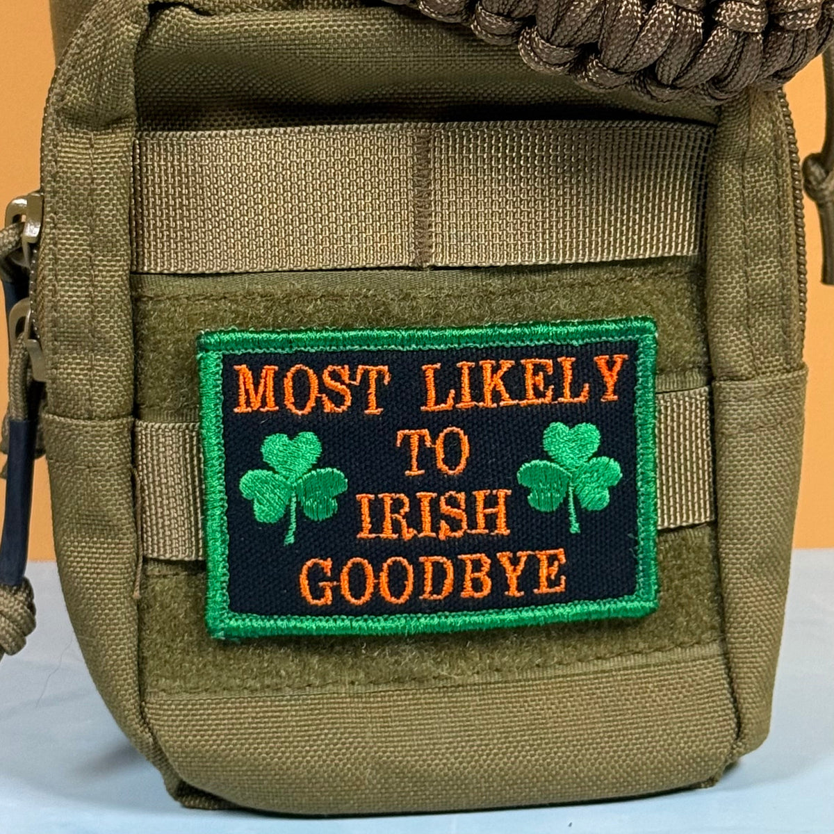 Most Likely To Irish Goodbye Funny Morale Patch, 2x3" | Made in USA | VELCRO® Brand Hook Backing