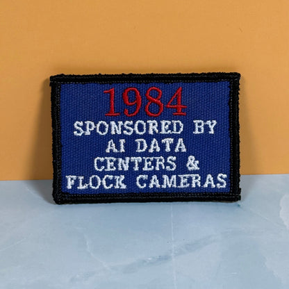 1984 - Sponsored by AI Data Centers & Flock Cameras Funny Morale Patch, 2x3" | Made in USA | VELCRO® Brand Hook Backing
