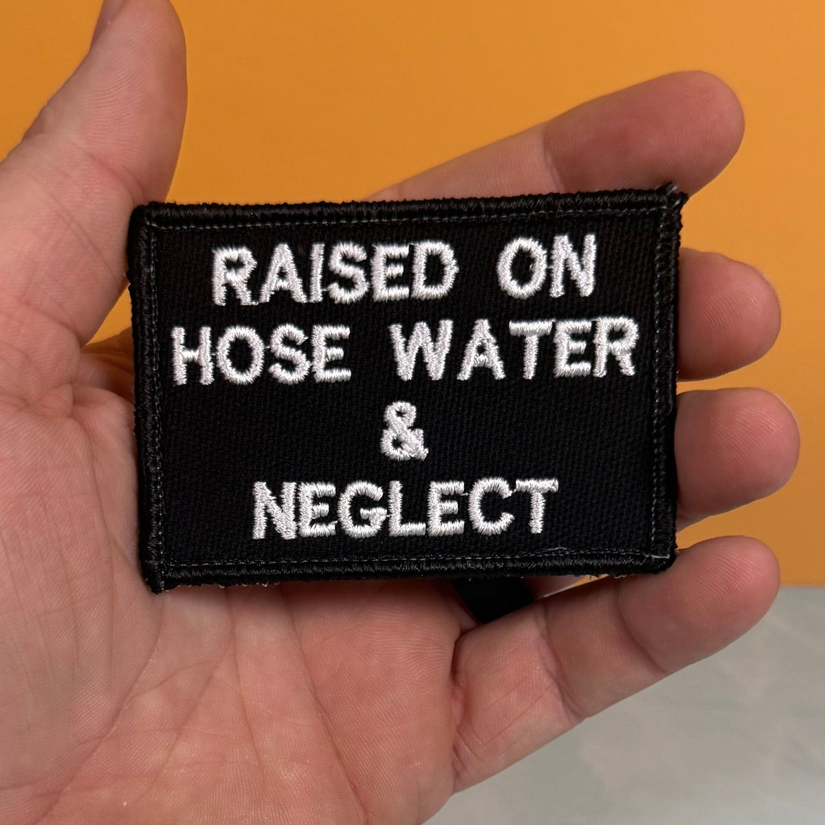 Raised on Hose Water & Neglect Funny Morale Patch, 2x3" | Made in USA | VELCRO® Brand Hook Backing