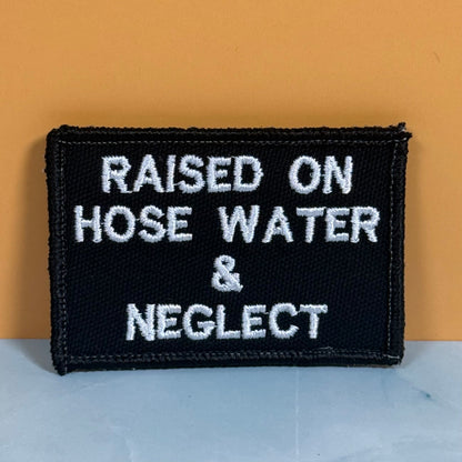 Raised on Hose Water & Neglect Funny Morale Patch, 2x3" | Made in USA | VELCRO® Brand Hook Backing