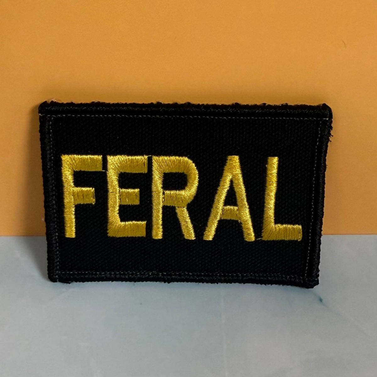 Feral & Wild Funny Morale Patch, 2x3" | Made in USA | VELCRO® Brand Hook Backing