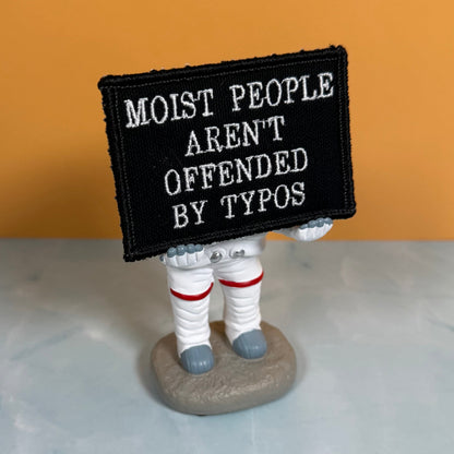 Moist People Aren’t Offended by Typos Funny Morale Patch, 2x3" | Made in USA | VELCRO® Brand Hook Backing