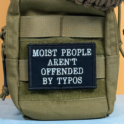 Moist People Aren’t Offended by Typos Funny Morale Patch, 2x3" | Made in USA | VELCRO® Brand Hook Backing