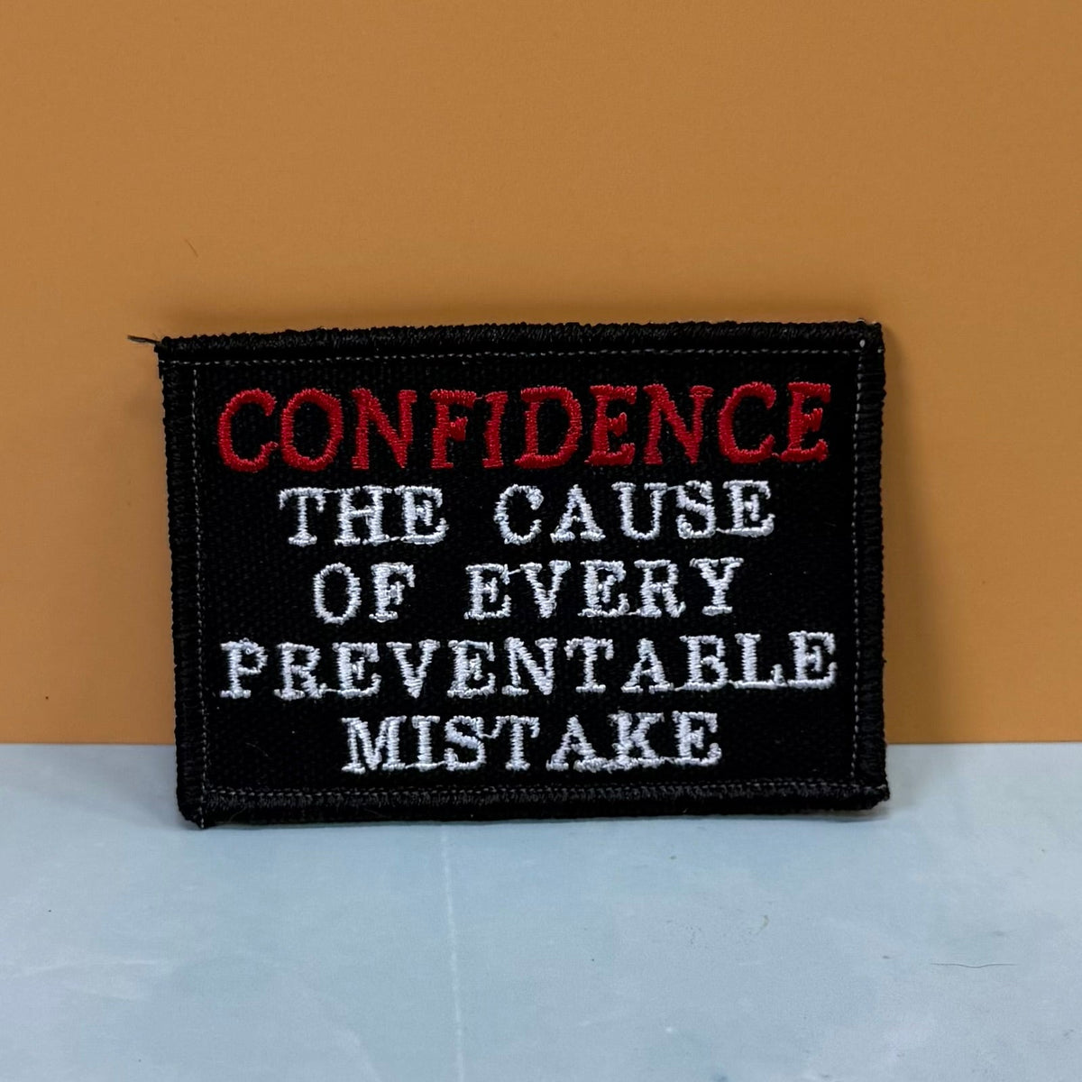 Confidence Causes Mistakes Funny Embroidered Morale Patch, 2x3" | VELCRO® Brand Hook Backing