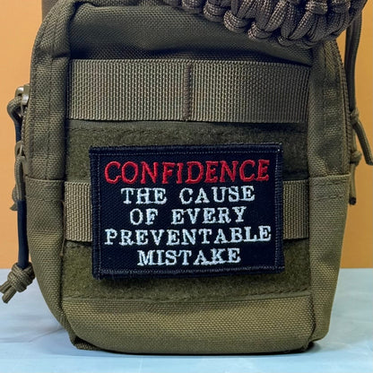 Confidence Causes Mistakes Funny Embroidered Morale Patch, 2x3" | VELCRO® Brand Hook Backing