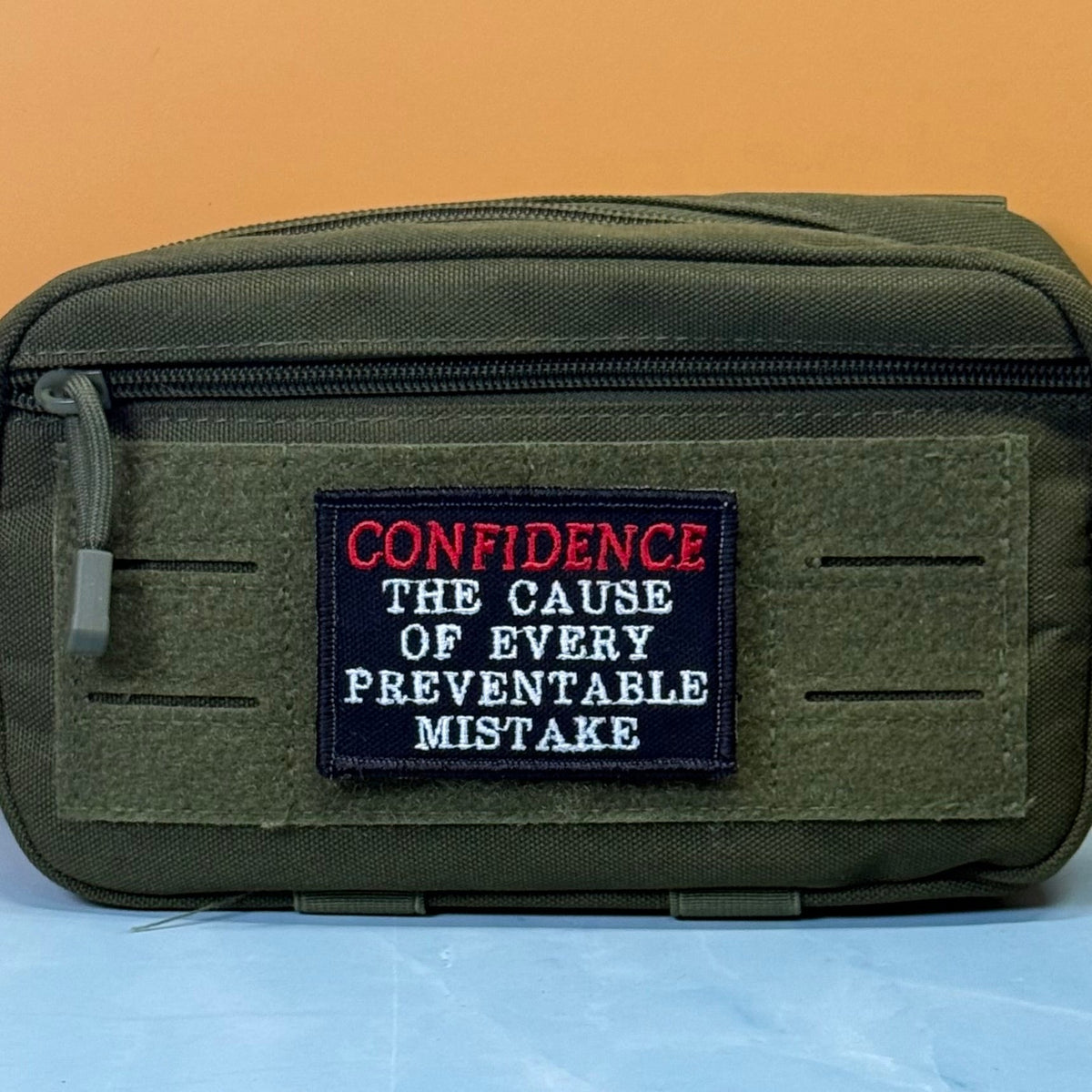Confidence Causes Mistakes Funny Embroidered Morale Patch, 2x3" | VELCRO® Brand Hook Backing