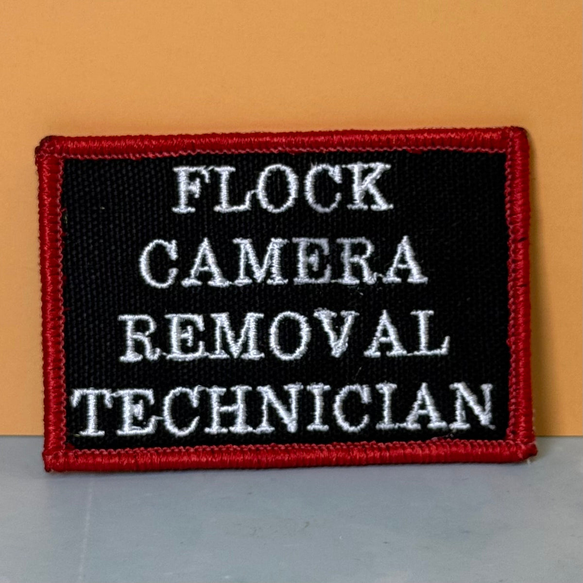 Flock Camera Removal Technician Funny Embroidered Morale Patch, 2x3" | VELCRO® Brand Hook Backing